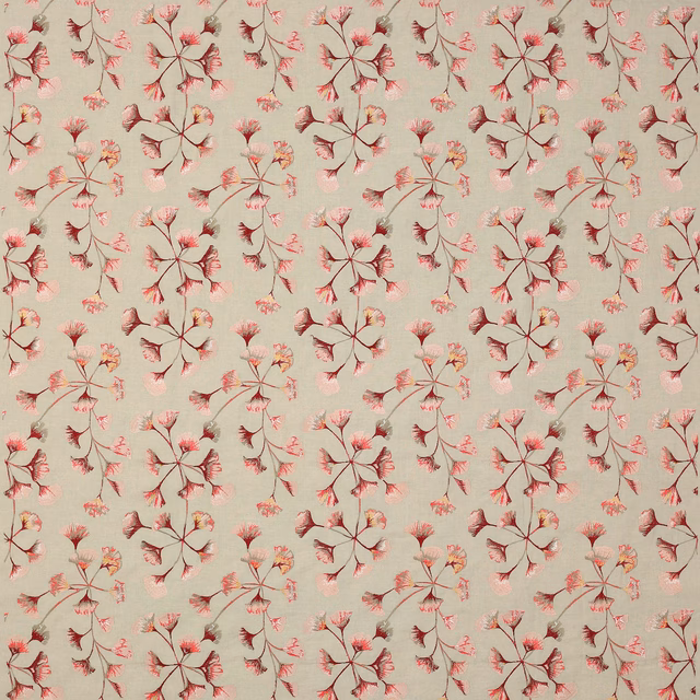 Pink and red ginkgo leaf motif on a soft blush woven fabric swatch