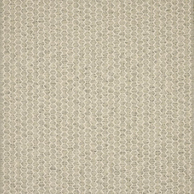 Close-up of soft sage green geometric woven fabric with zigzag stripe texture