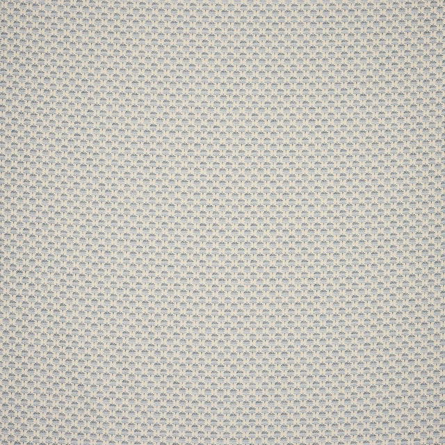Small repeating blue motif on a cream textured fabric swatch