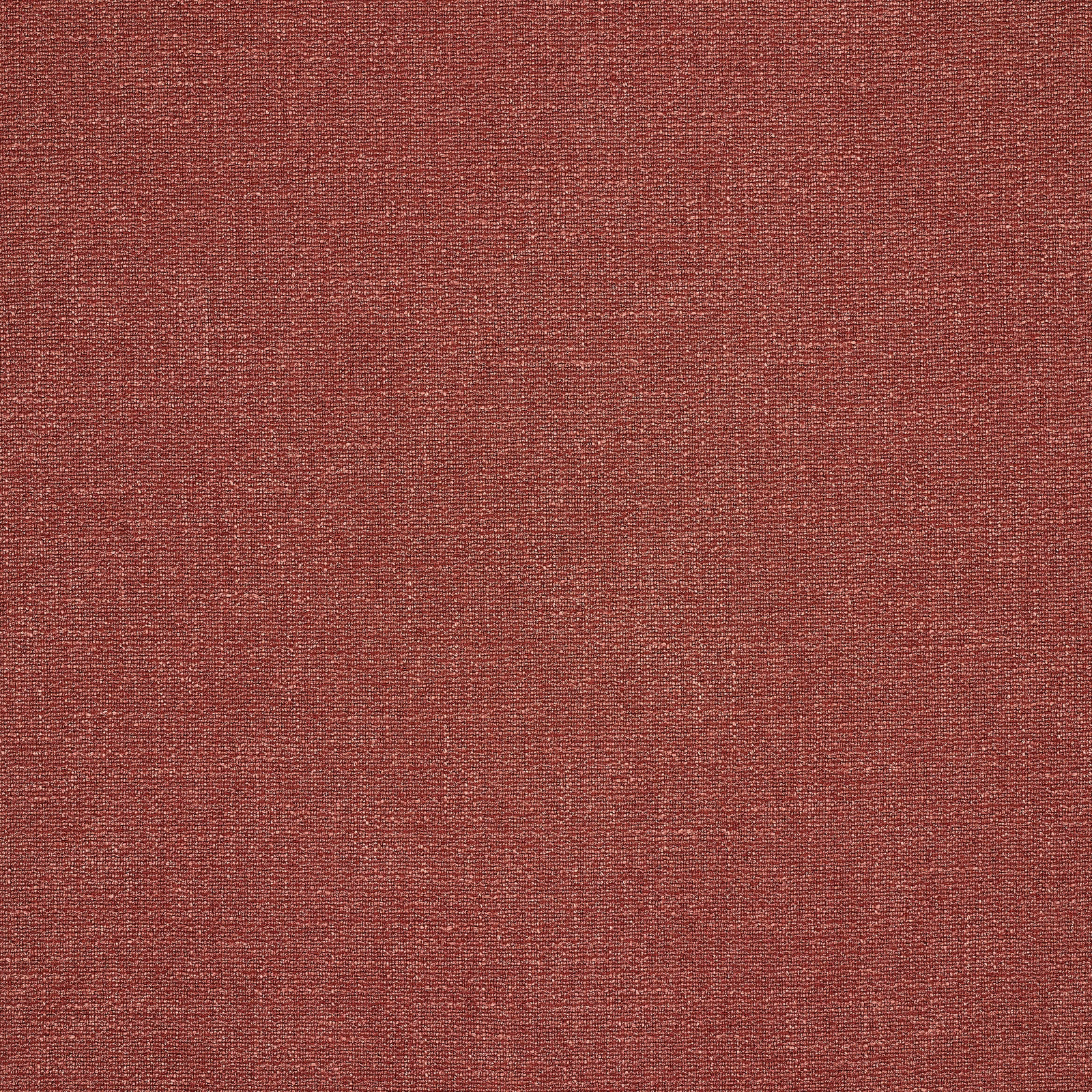 Close-up of a muted terracotta plain-woven fabric with fine texture