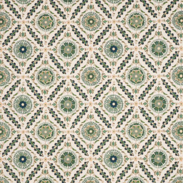 Green and cream geometric floral fabric with repeating medallions and diagonal sprigs