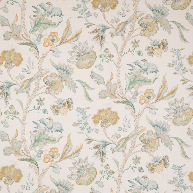 Large floral linen fabric with pale blue, mint and ochre tree pattern on ivory ground