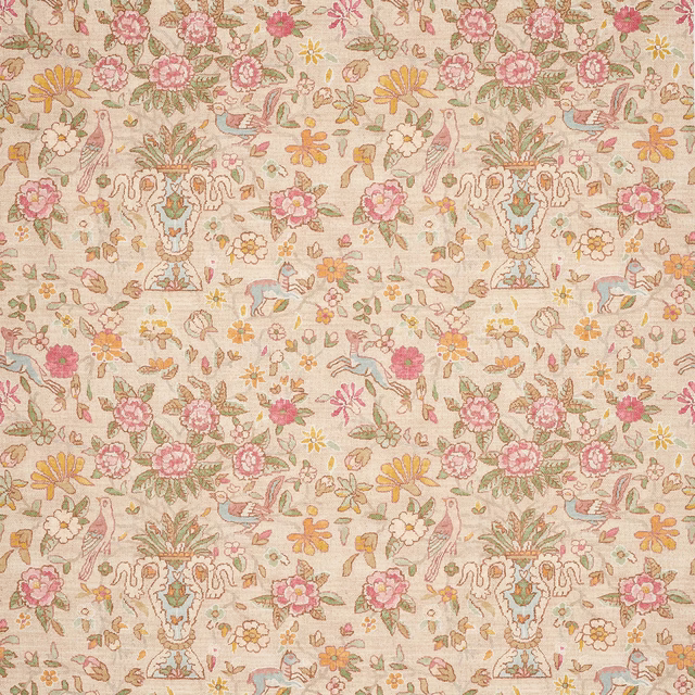 Pastel floral linen with pink, green and yellow motifs on a cream ground