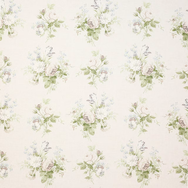 Cream linen fabric with scattered pale floral bouquets and sage green leaves
