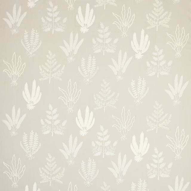 Soft beige fabric with pale ivory botanical leaf motif
