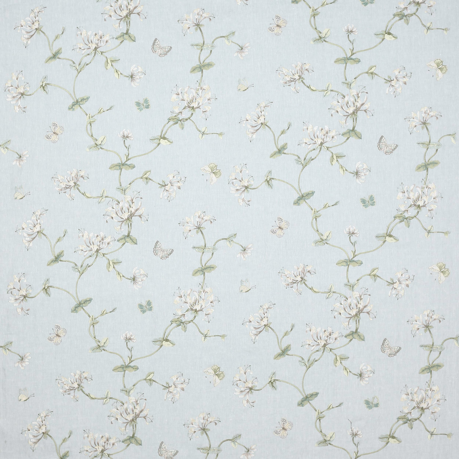 Pale old blue floral fabric with green trailing vines and white blossoms
