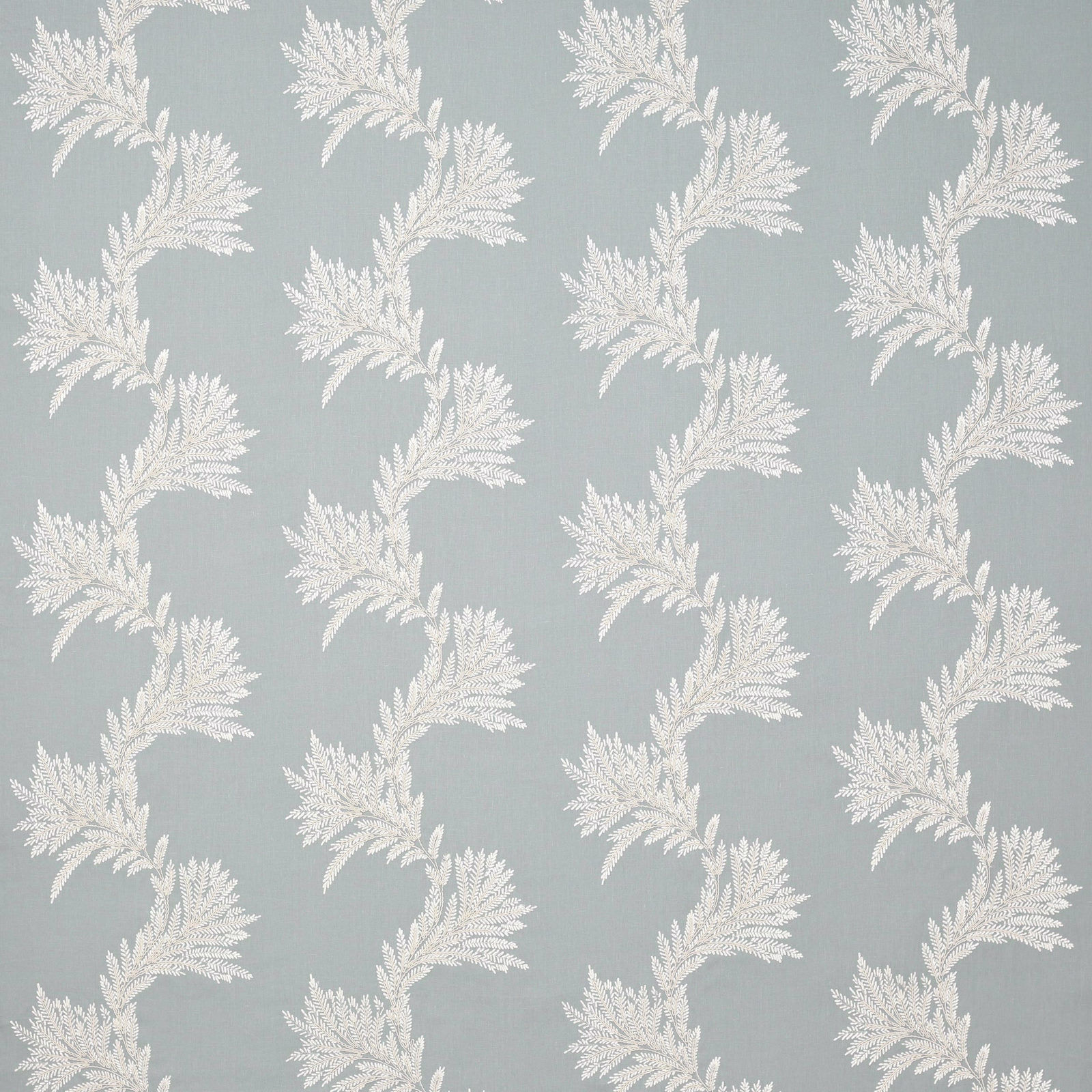 Soft blue fabric with ivory leafy botanical repeat