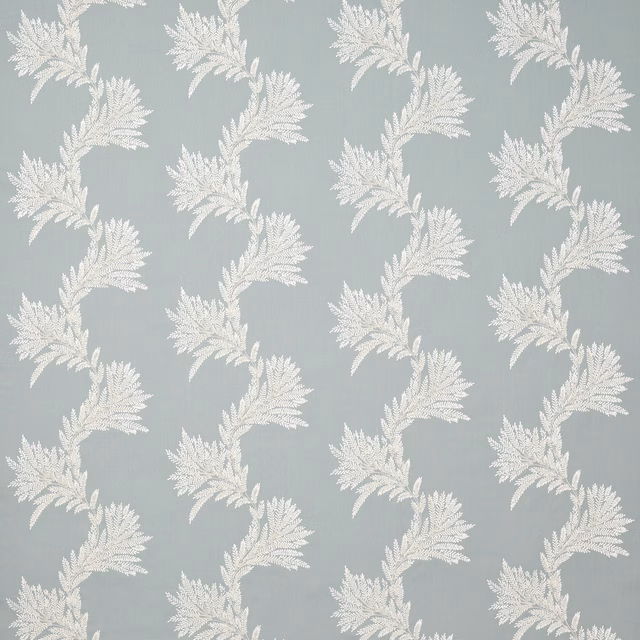 Soft blue fabric with ivory leafy botanical repeat