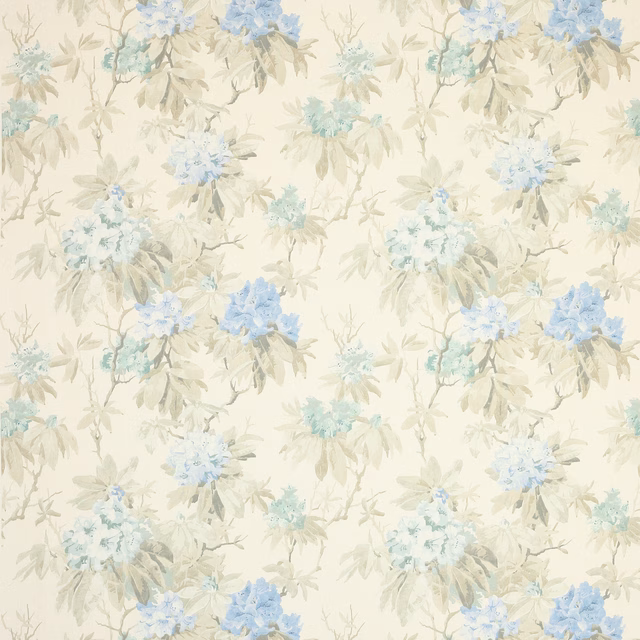 Pale blue floral print on beige linen with soft leafy stems