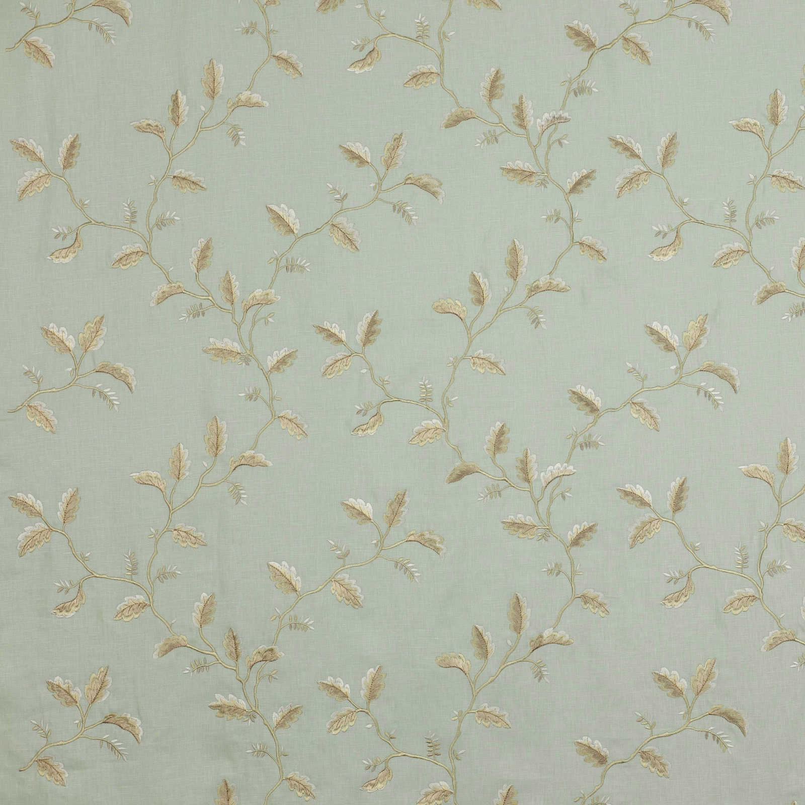 Soft blue-green floral fabric with trailing leaf vine motif and warm cream embroidery