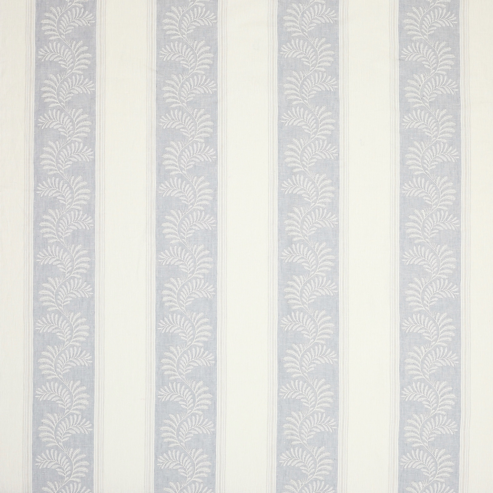 Pale blue-grey striped fabric with repeating leaf motif on a soft cream ground