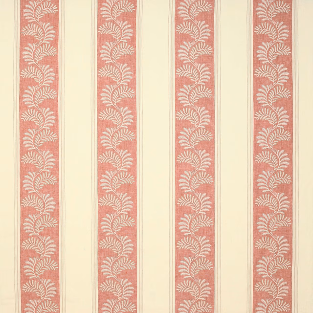 Coral-red striped fabric with cream leaf motif on a pale ground