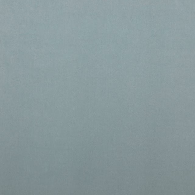Plain soft aqua-blue fabric swatch with a smooth, even woven finish
