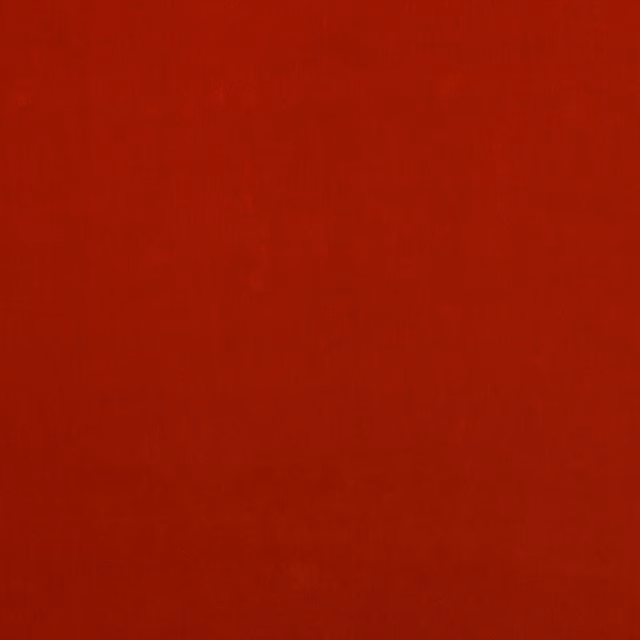 Plain burnt orange-red fabric swatch with a smooth, even surface