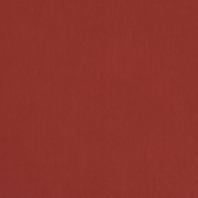Solid hot pink fabric swatch with a warm coral undertone and smooth plain weave