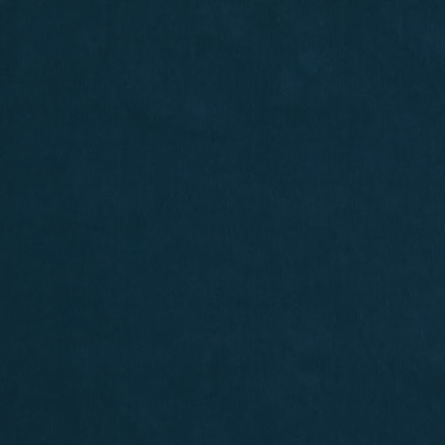 Deep teal-blue plain fabric swatch with a smooth, softly shaded surface