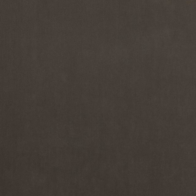Deep charcoal plain woven fabric swatch with a soft matte finish