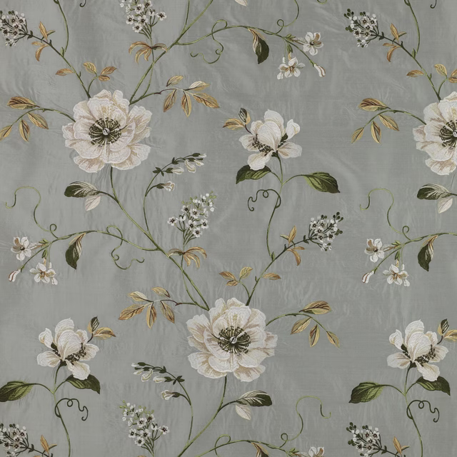 Large ivory floral sprays and green stems on soft old blue grey fabric