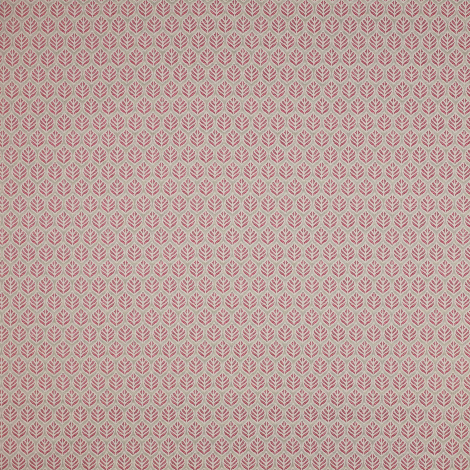 Small repeating pink leaf motif on a pale neutral woven fabric