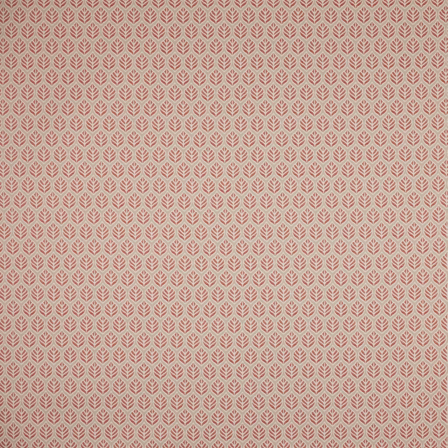 Small repeating leaf motif fabric in soft dusty red and pale ground