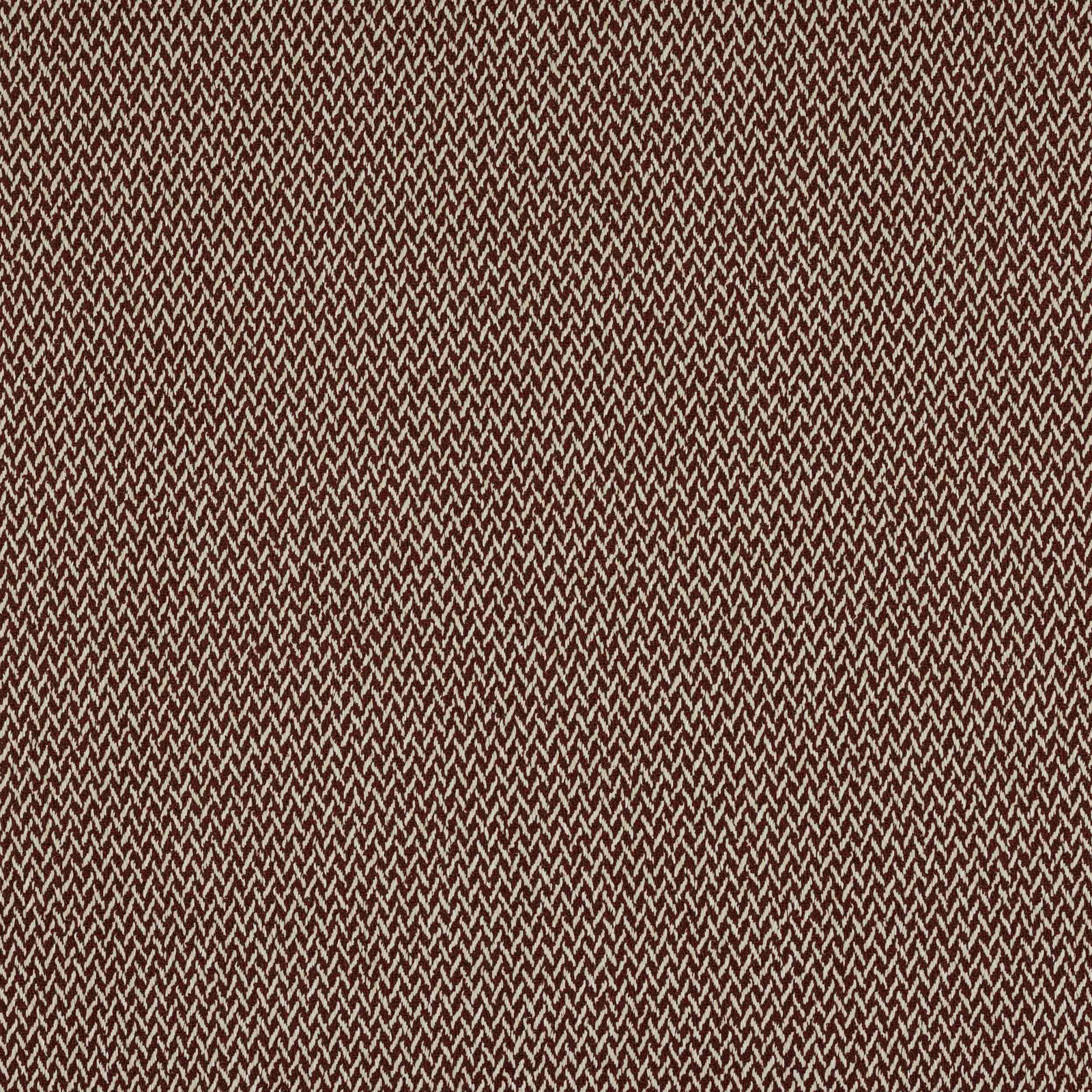 Close-up of warm brick red small check weave with textured zigzag threads