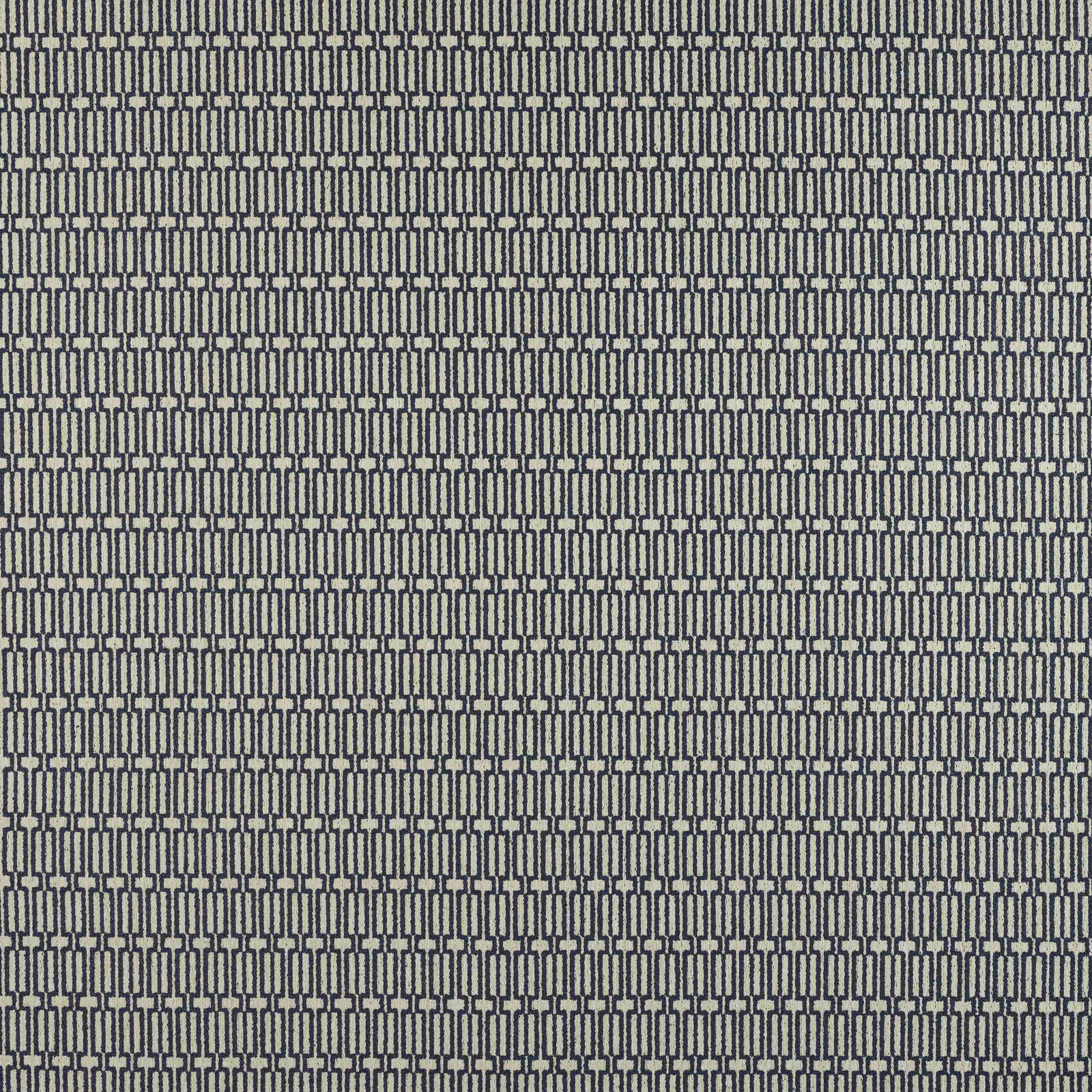 Small geometric fabric in deep teal blue on a pale ground