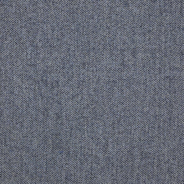 Muted blue herringbone wool-blend fabric with fine textured weave