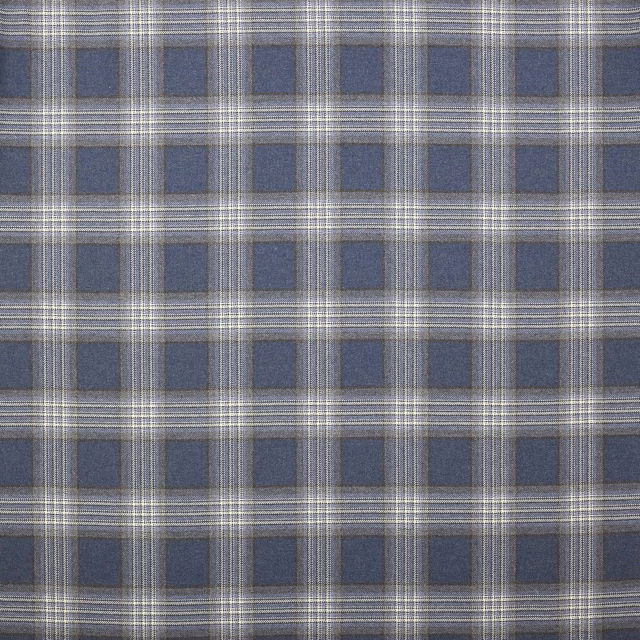 Blue wool plaid with grey and cream checks on a flat swatch