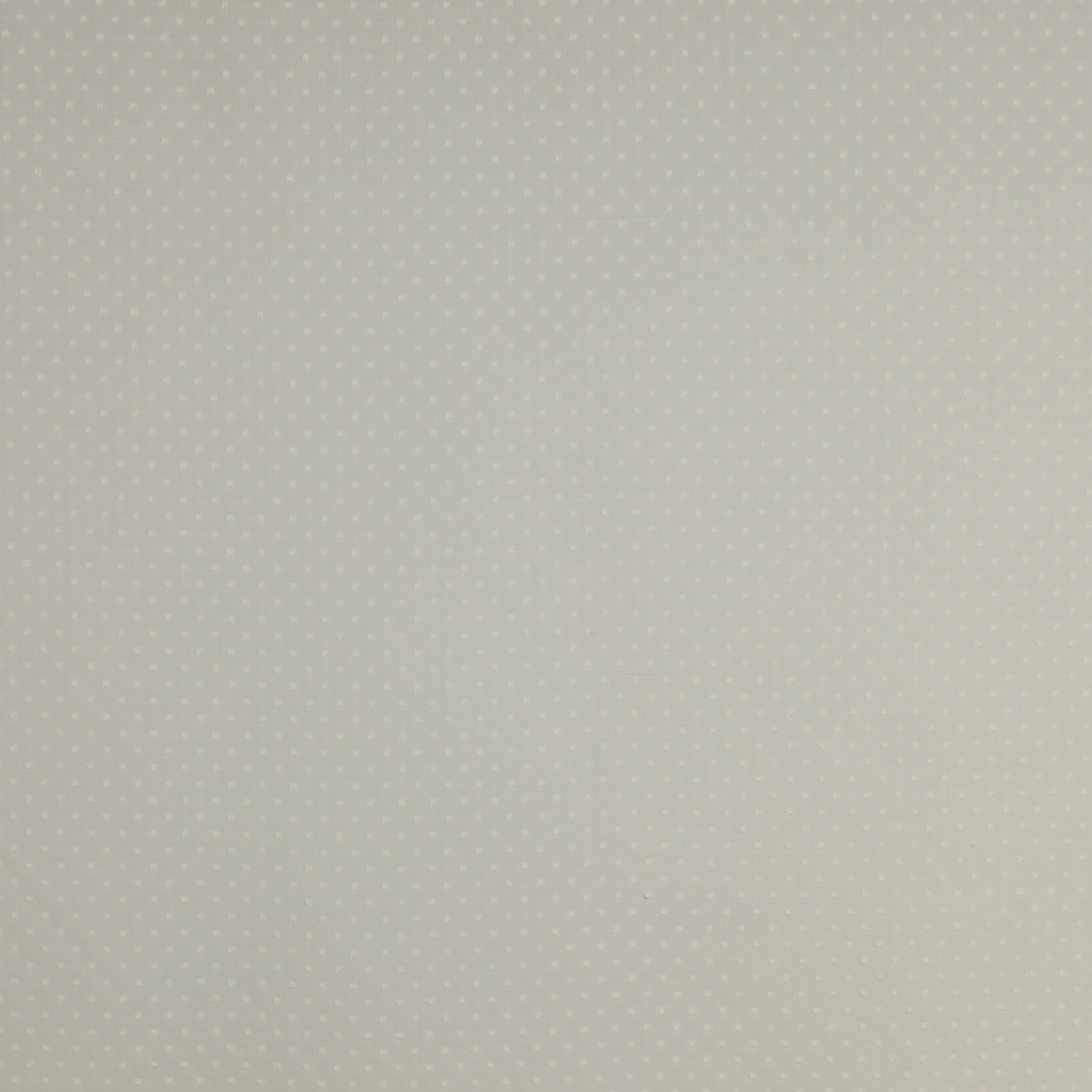 Pale cream cotton voile with tiny regular dotted motif