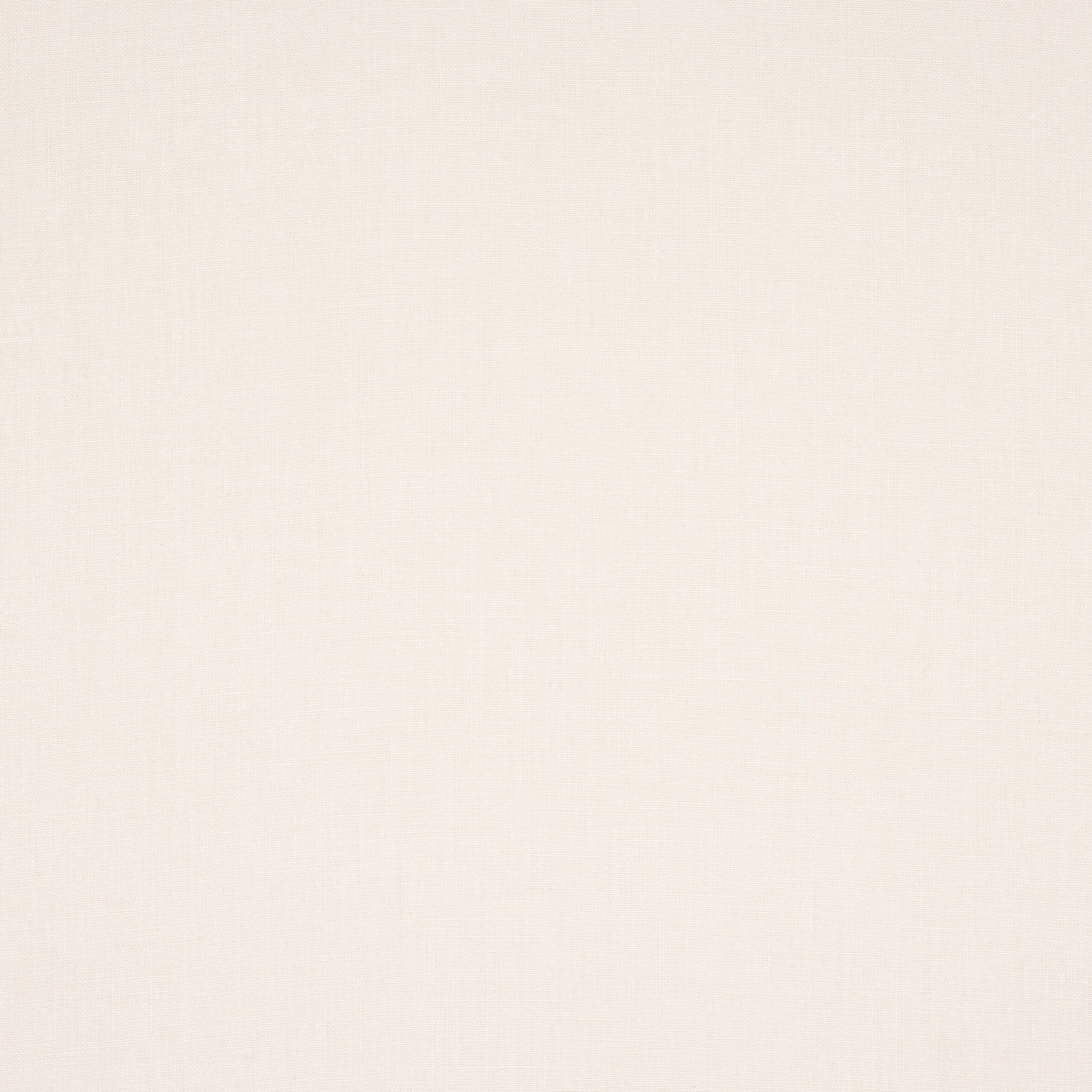 Close-up of soft ivory plain linen fabric with subtle natural texture