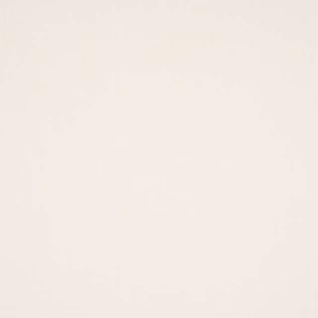 Close-up of soft ivory plain linen fabric with subtle natural texture