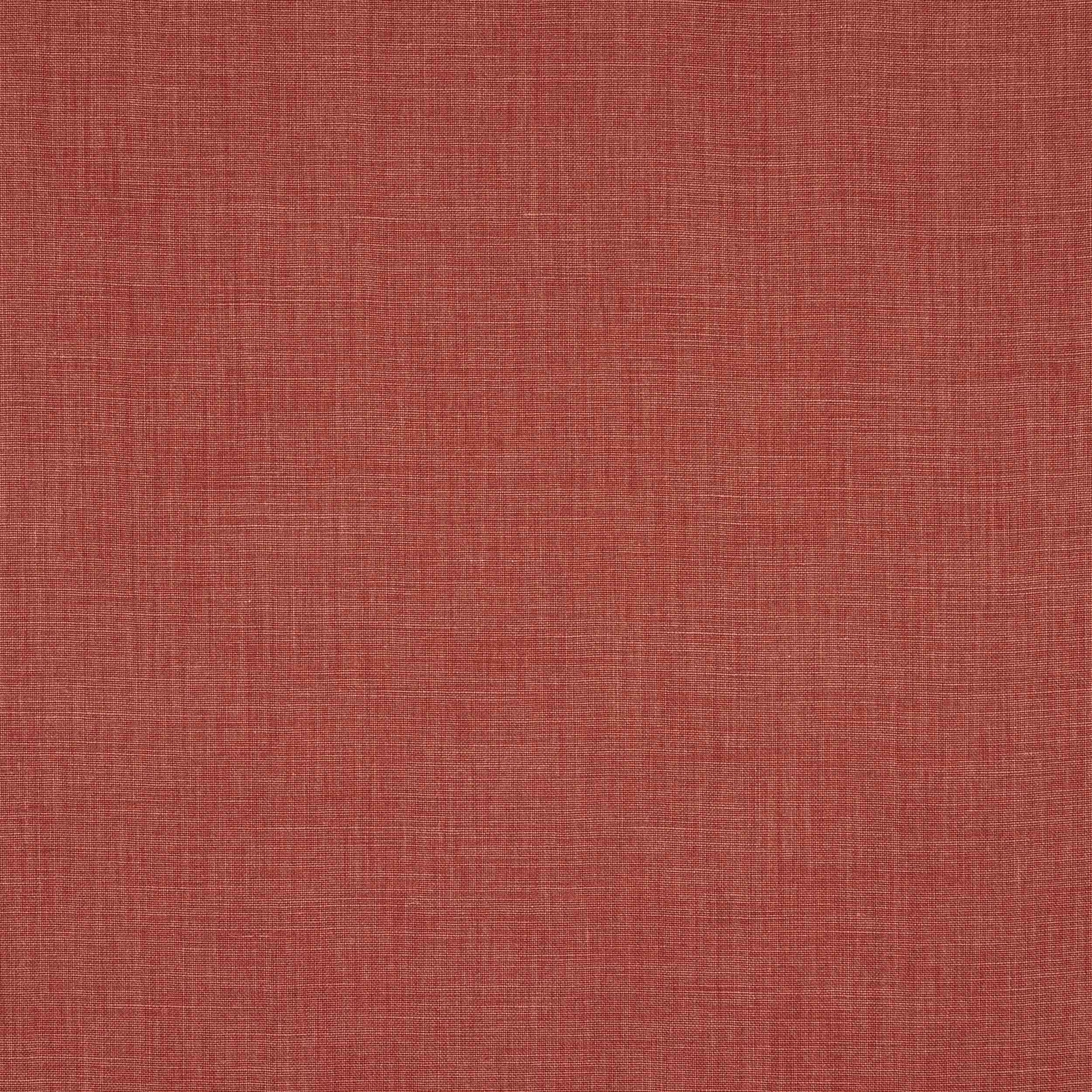 Close-up of a tomato red linen weave with a softly mottled plain texture