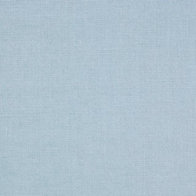 Close-up of a soft marine blue plain linen weave with fine texture