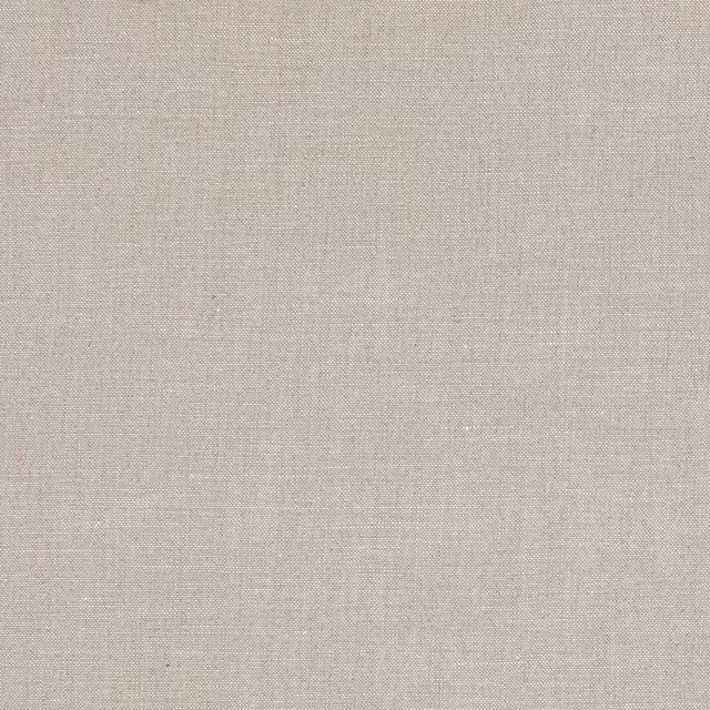 Close-up of warm oatmeal linen with fine natural slub and plain weave