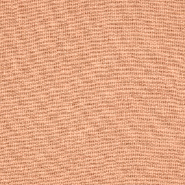 Soft apricot terracotta plain-weave linen fabric swatch