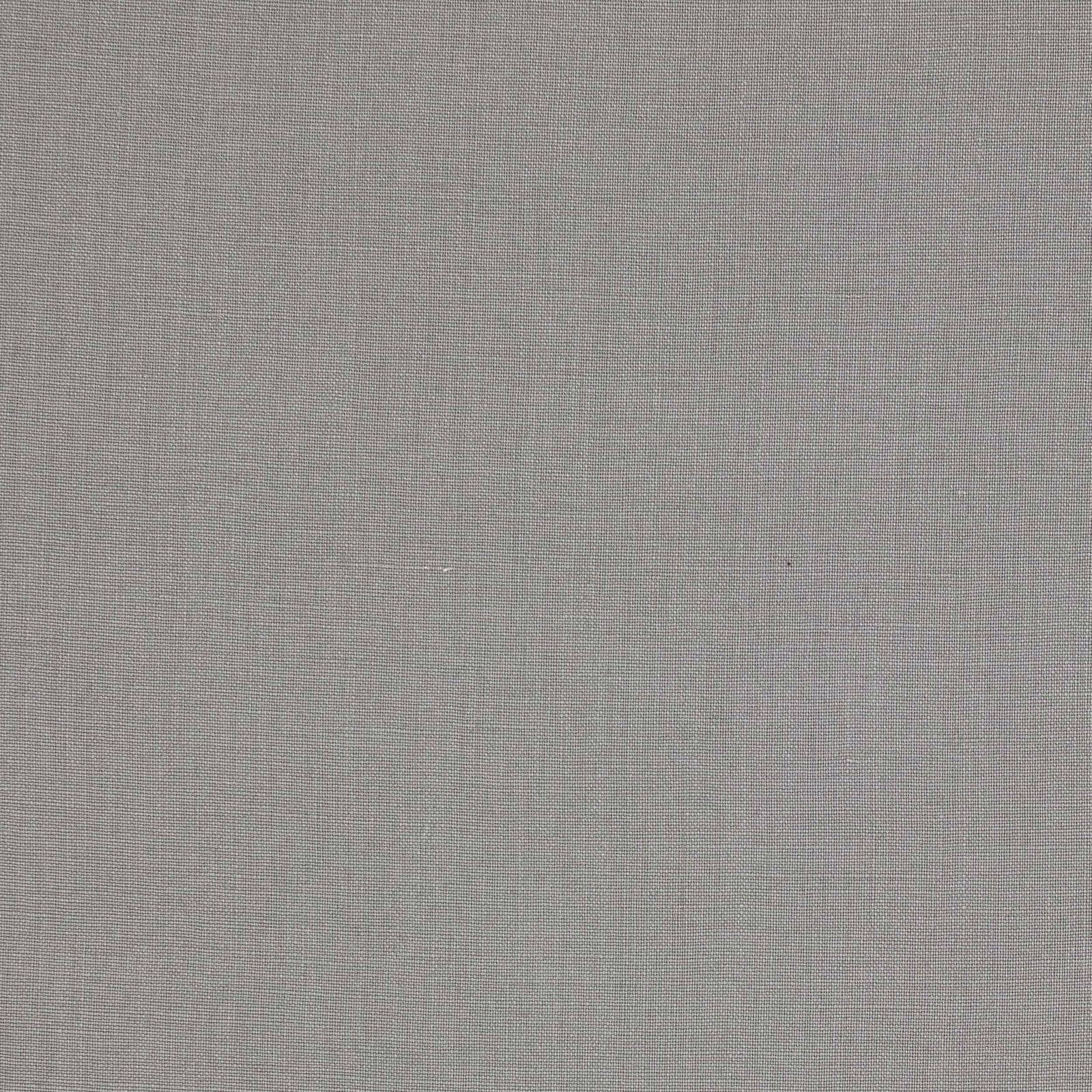 Close-up of pale silver-grey plain linen fabric with fine woven texture