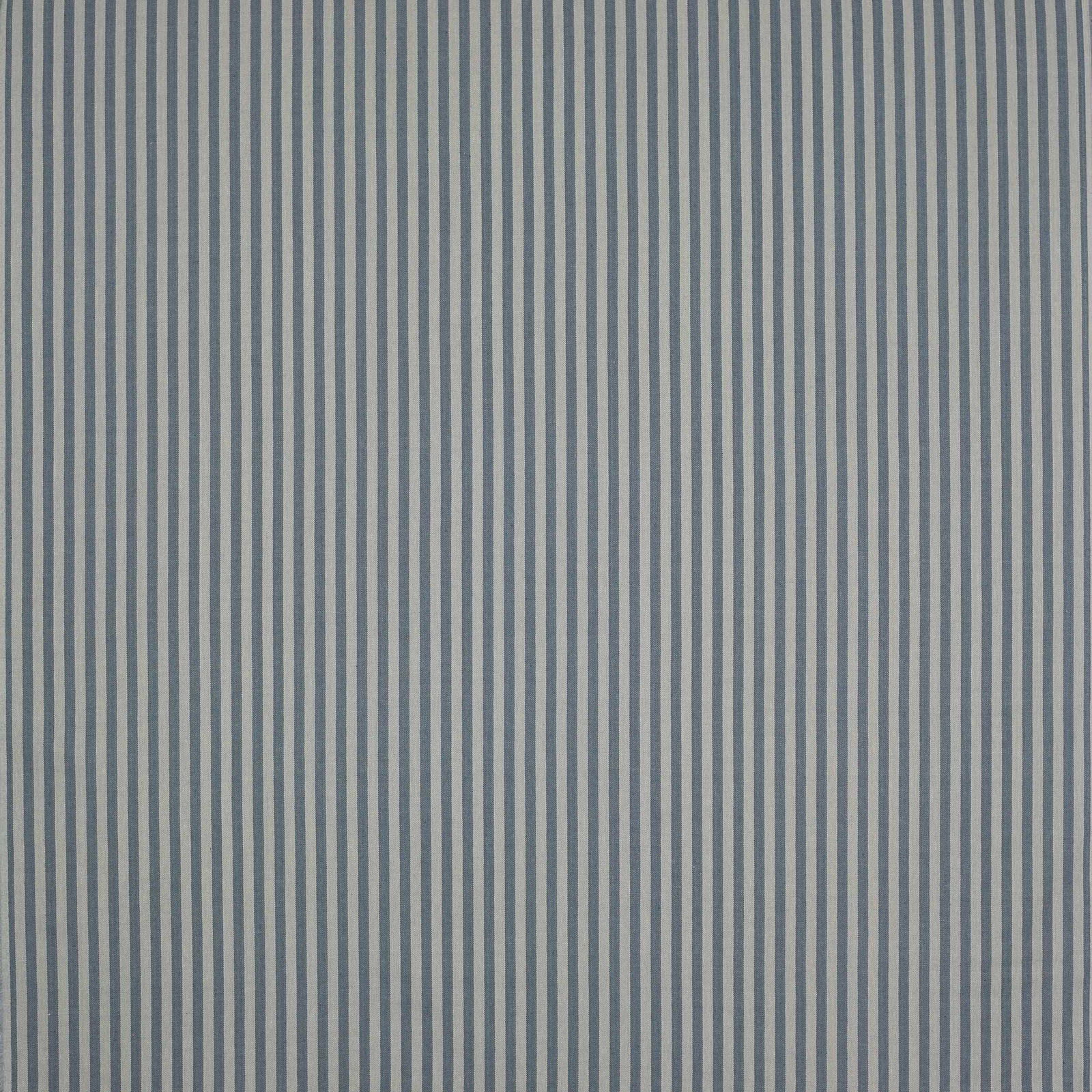 Fine vertical blue and pale stripe linen fabric with a dry woven texture