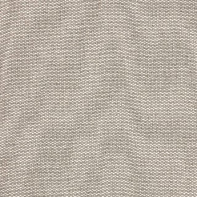 Close-up of soft oatmeal beige linen fabric with fine plain weave