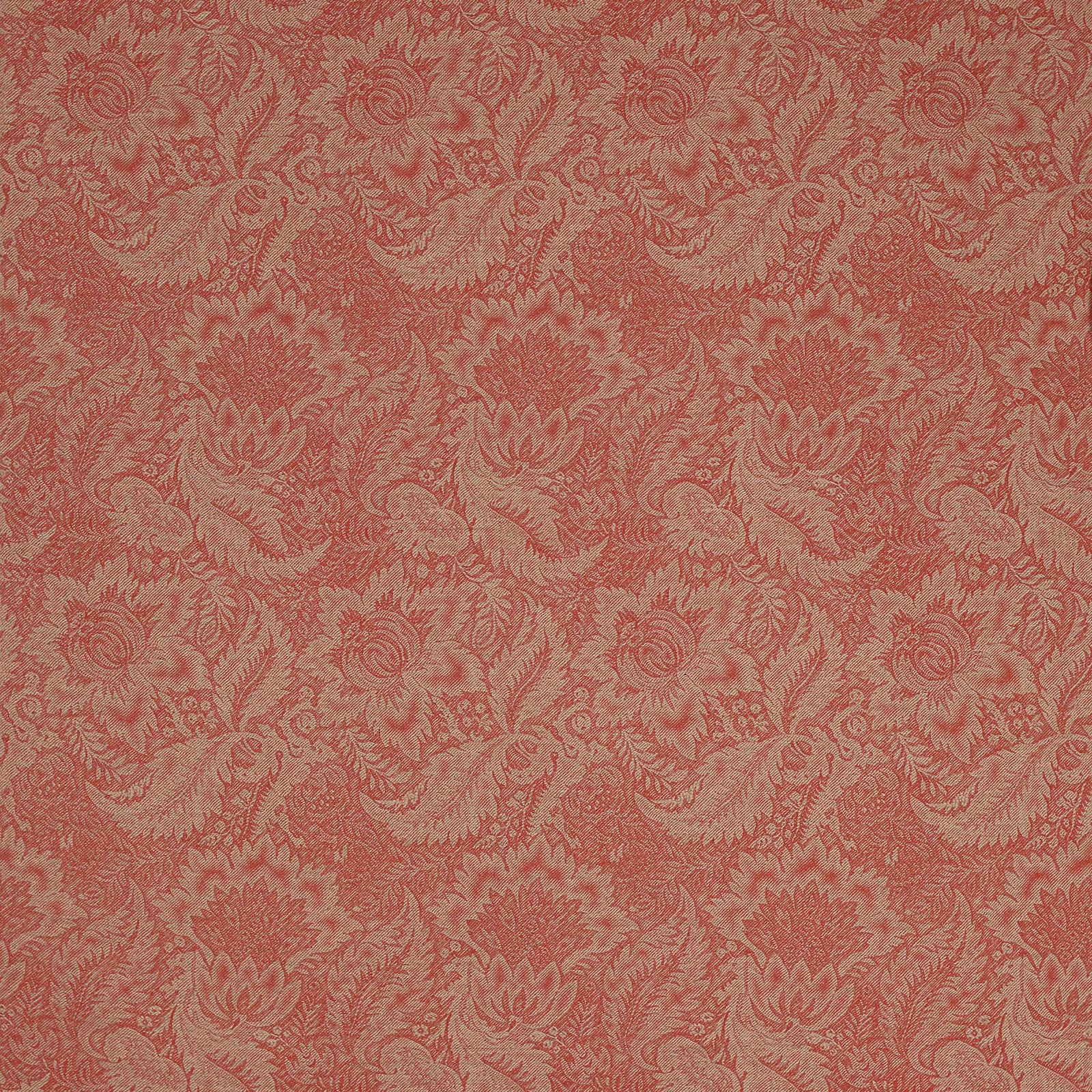 Coral-red damask fabric with ornate woven scrolling motif on a textured ground