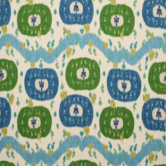 Pale ground linen fabric with blue and kiwi green oval motifs and wavy bands