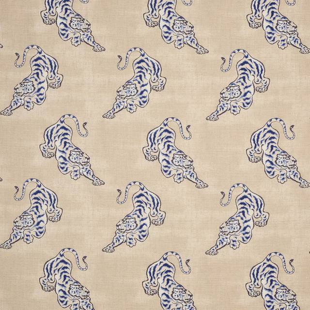Beige linen fabric with repeating blue tiger motif and natural textured weave