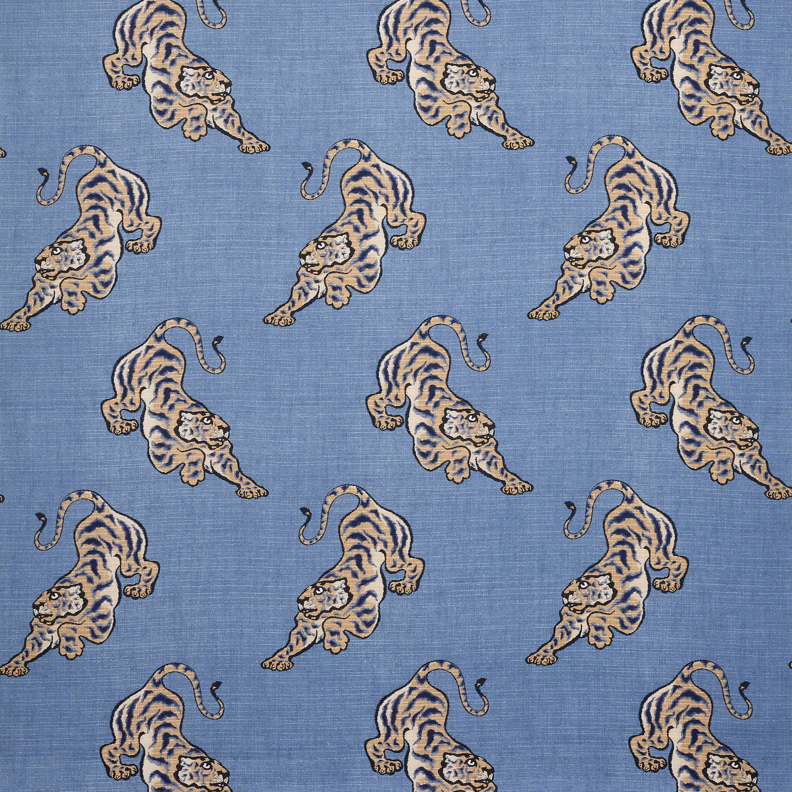 Blue linen fabric with repeated leaping tiger motif and textured weave