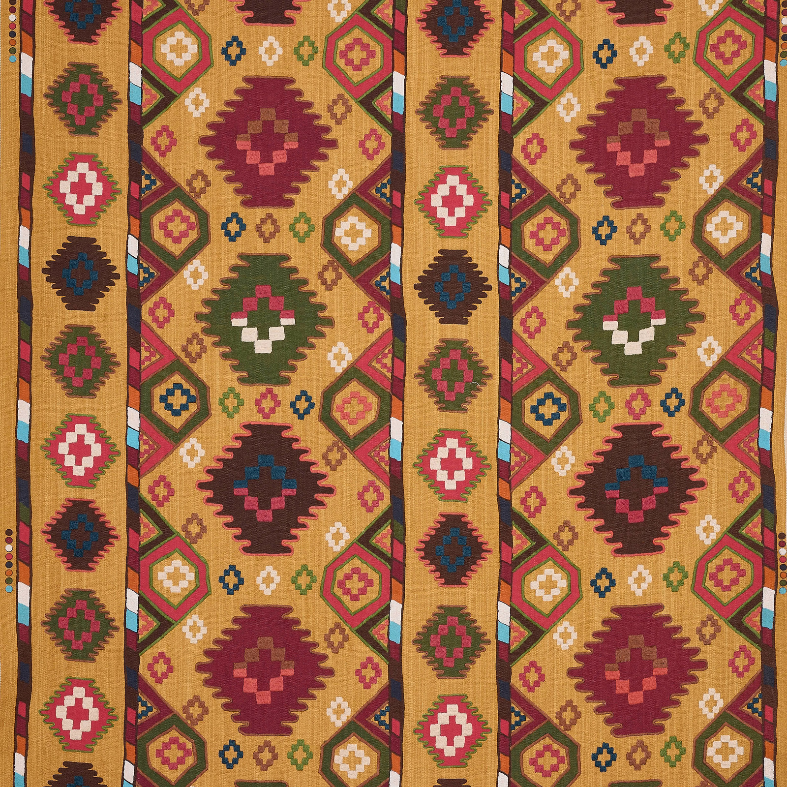 Geometric woven fabric in curry gold with burgundy, green and teal motifs