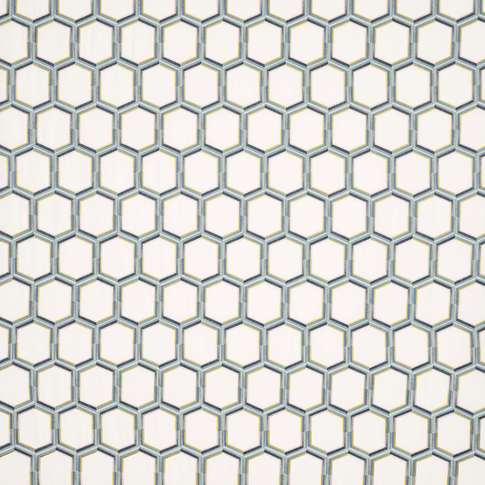 Pale blue-grey hexagonal geometric fabric with a light ground and fine woven outline