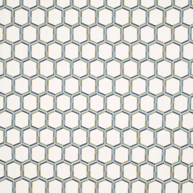 Pale blue-grey hexagonal geometric fabric with a light ground and fine woven outline