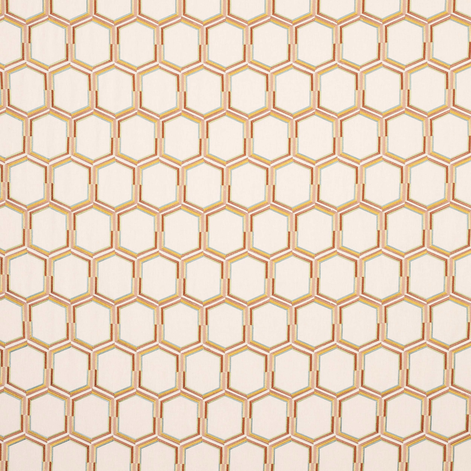 Hexagonal geometric fabric with terracotta and gold outlines on a pale ground