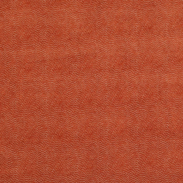 Close-up of a warm copper terracotta woven fabric with fine speckled texture