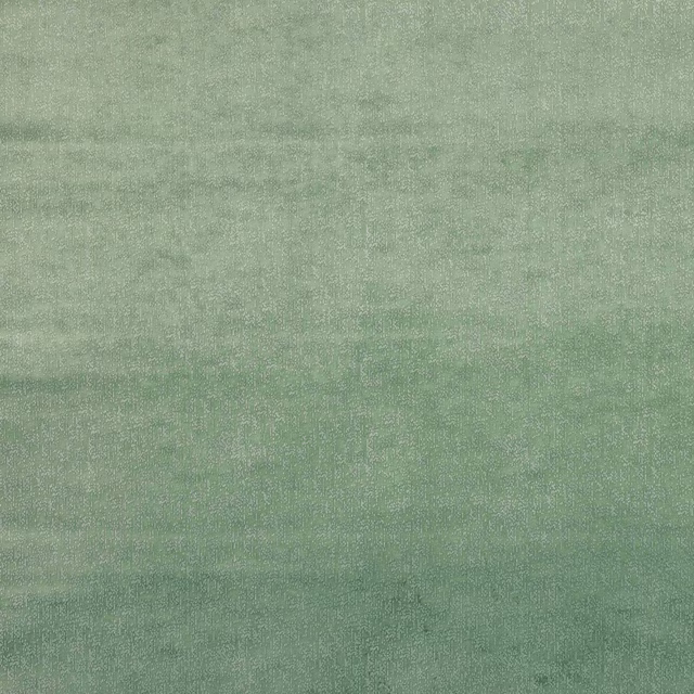 Soft sage green fabric swatch with a subtle textured weave and muted tonal depth