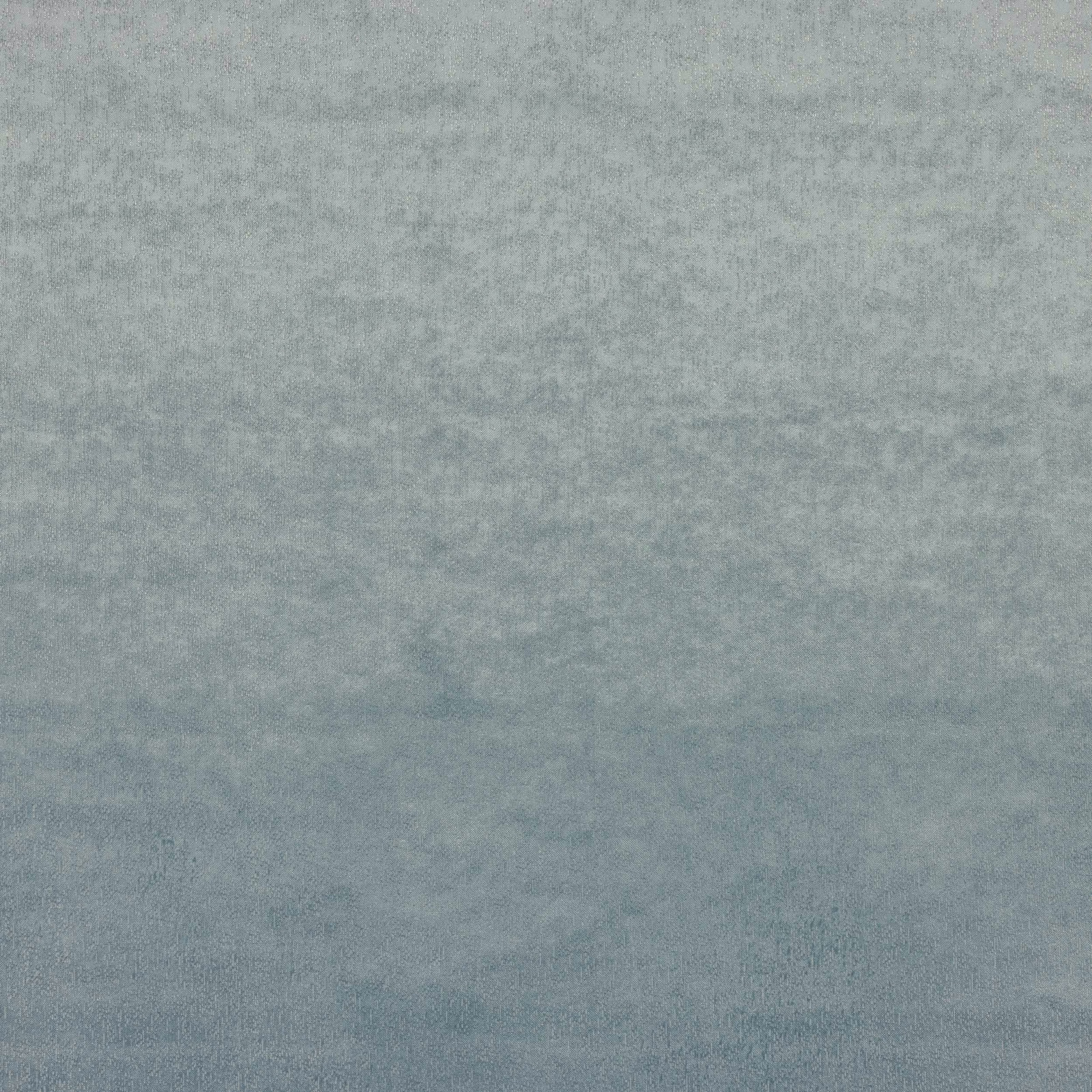 Muted slate blue fabric swatch with a softly mottled matte texture