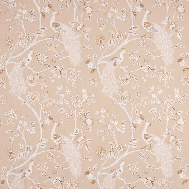 Beige fabric swatch with ivory peacocks, floral branches and trailing tree motif